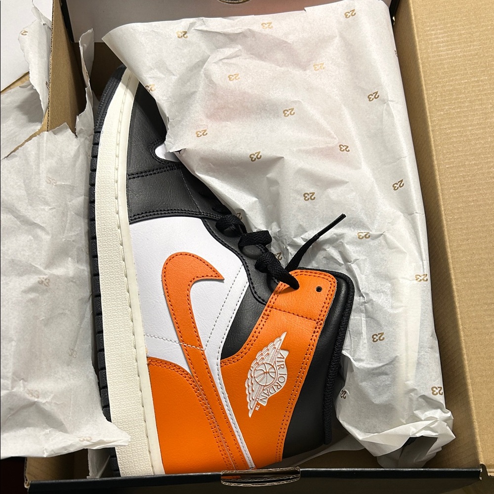 Jordan Men's Black, White, and Orange Sneakers